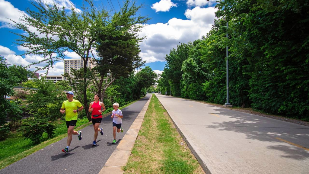 People running on Katy Trail Dallas